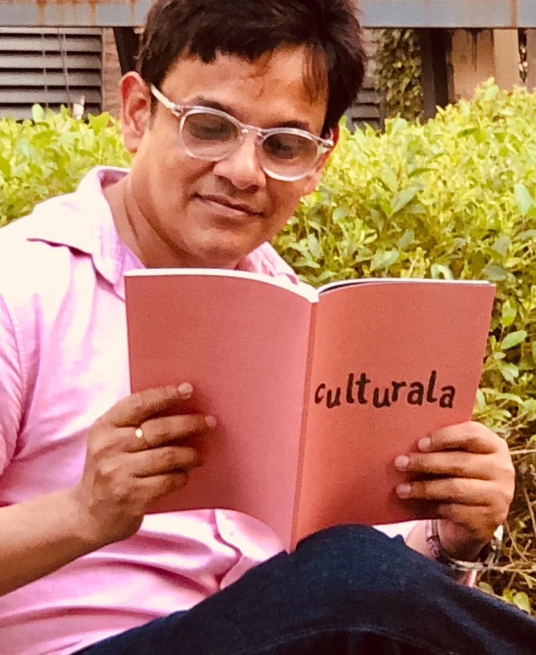 photo of Dhiman Gupta reading culturala